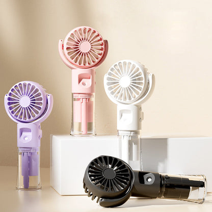 🌀 50% OFF NOW! 💧 Portable Rechargeable Handheld Misting Fan – USB charging & 3 speeds – Cools with fine mist – perfect for summer outings or travel 🌬️✨